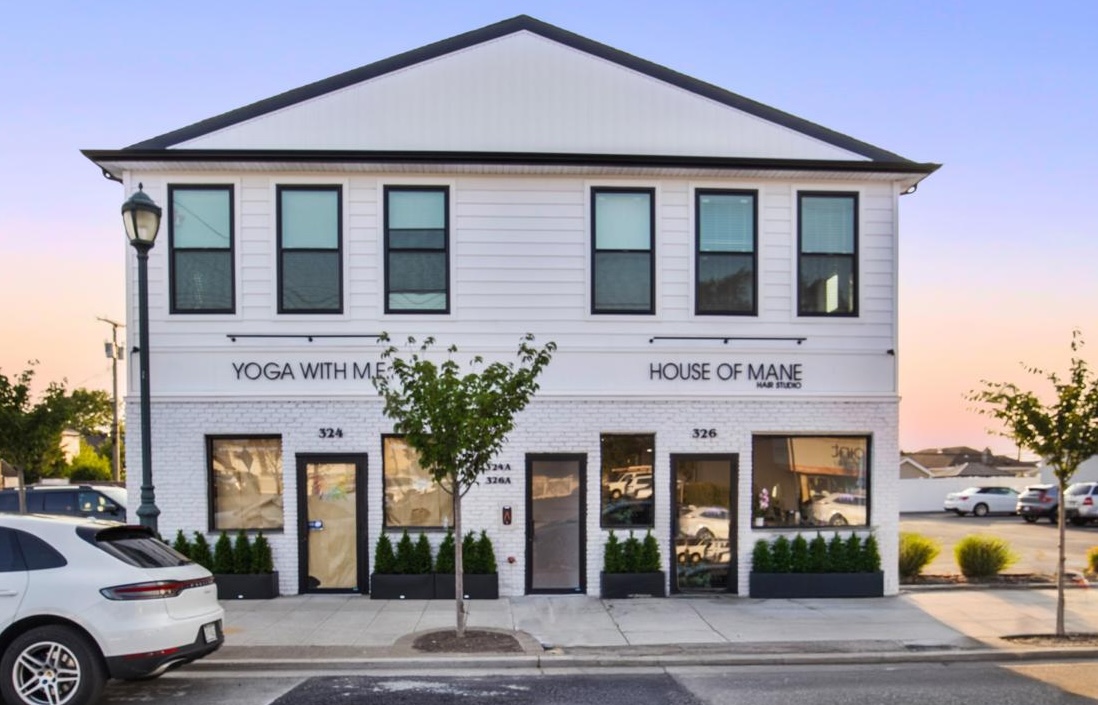Converted mixed-use building with retail stores and residential apartments